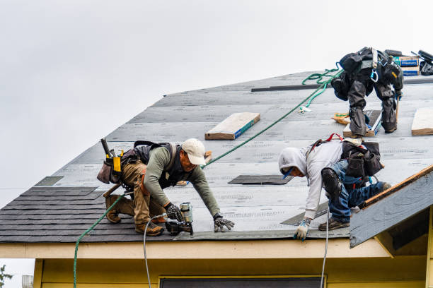 Professional Roof Replacement technician working in Redding, CA